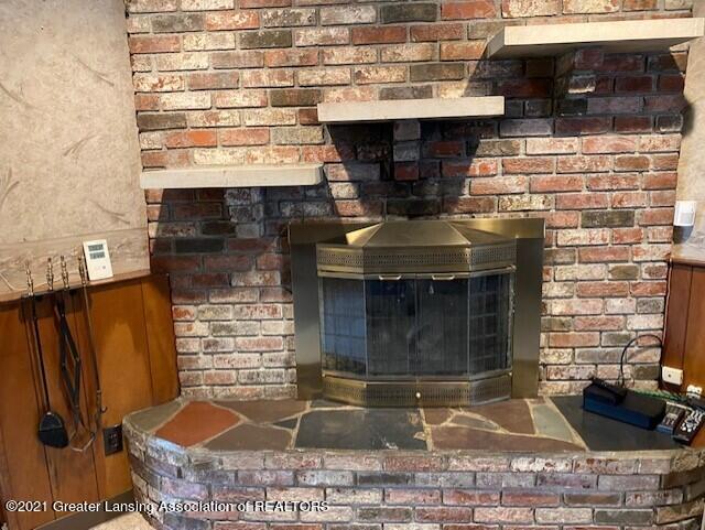 4754 River Ridge Drive Lansing, MI 48917 - Photo 27 of 46 fireplace