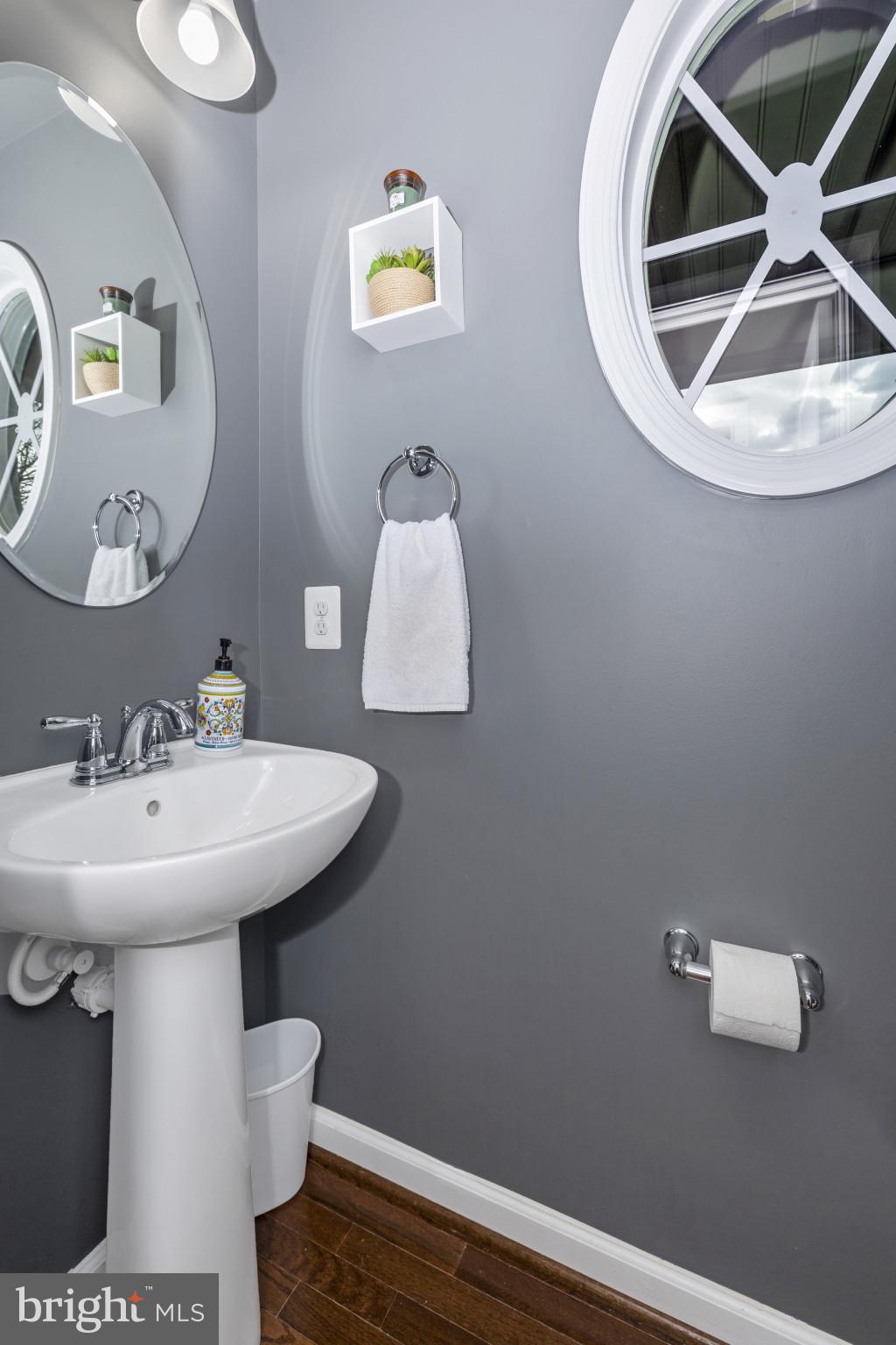 1912 Regiment Way Frederick, MD 21702 - Photo 21 of 45 a bathroom with a sink mirror and toilet