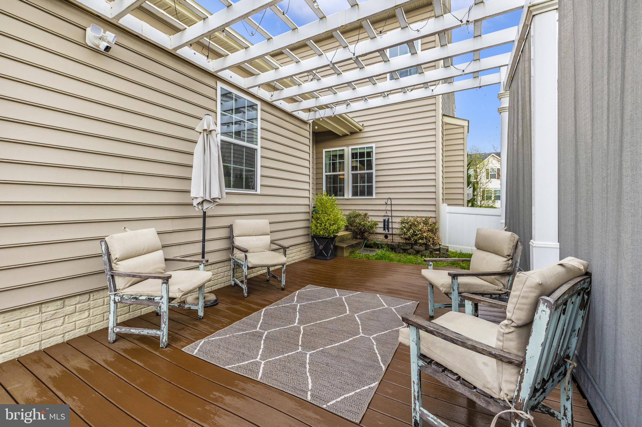 1912 Regiment Way Frederick, MD 21702 - Photo 43 of 45 a view of a dinning tables and chairs in a patio