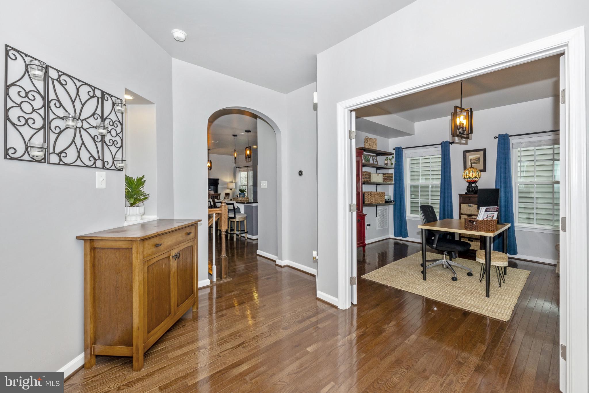 1912 Regiment Way Frederick, MD 21702 - Photo 6 of 45 a living room with furniture and wooden floor