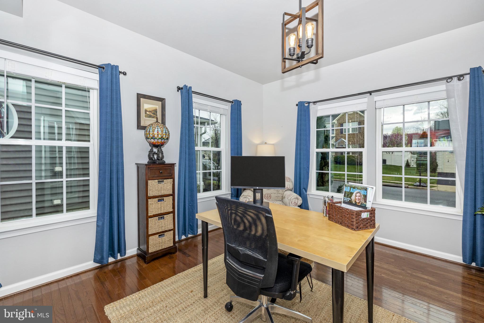1912 Regiment Way Frederick, MD 21702 - Photo 7 of 45 a view of a workspace with furniture and a window
