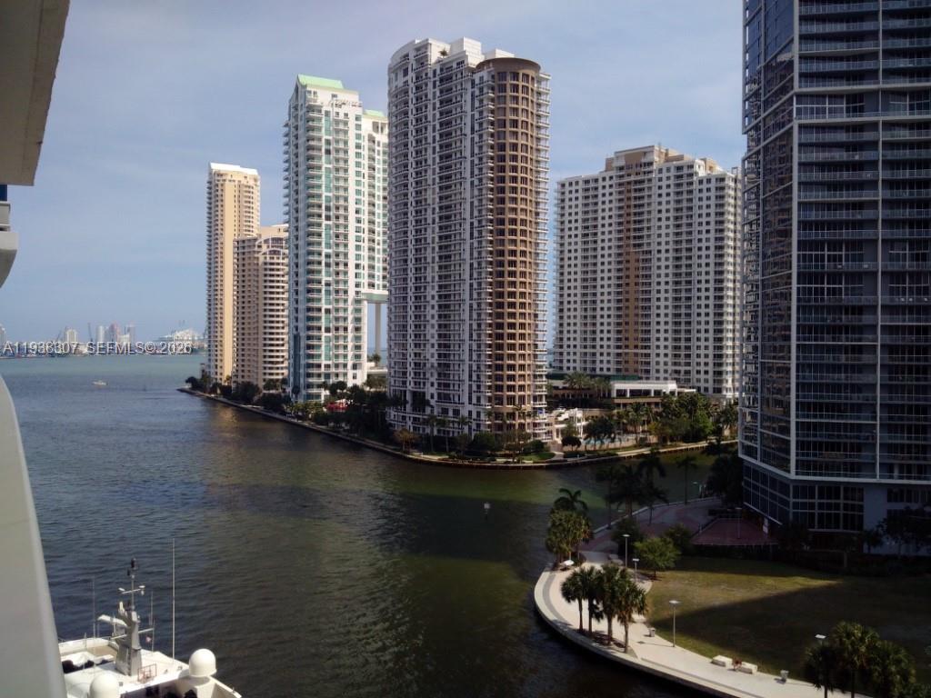 200 Biscayne Blvd Way, Unit 906 Miami, FL 33131 - Photo 25 of 44 a view of a lake with tall buildings