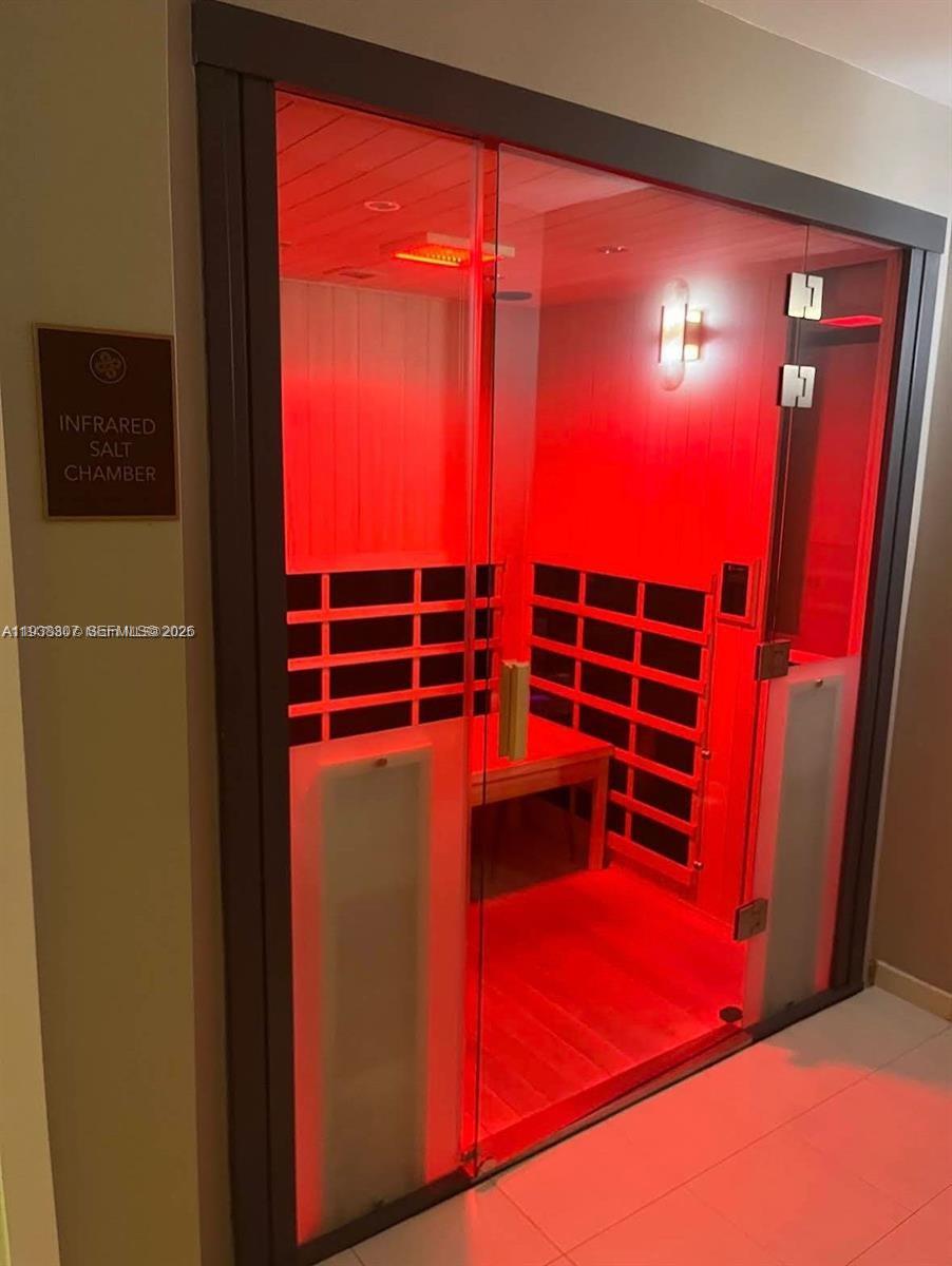 200 Biscayne Blvd Way, Unit 906 Miami, FL 33131 - Photo 38 of 44 a view of a room with windows and door