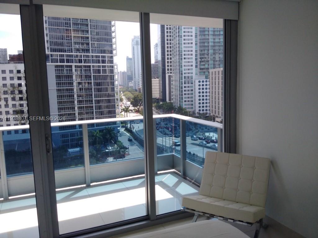200 Biscayne Blvd Way, Unit 906 Miami, FL 33131 - Photo 10 of 44 a view of balcony with couch
