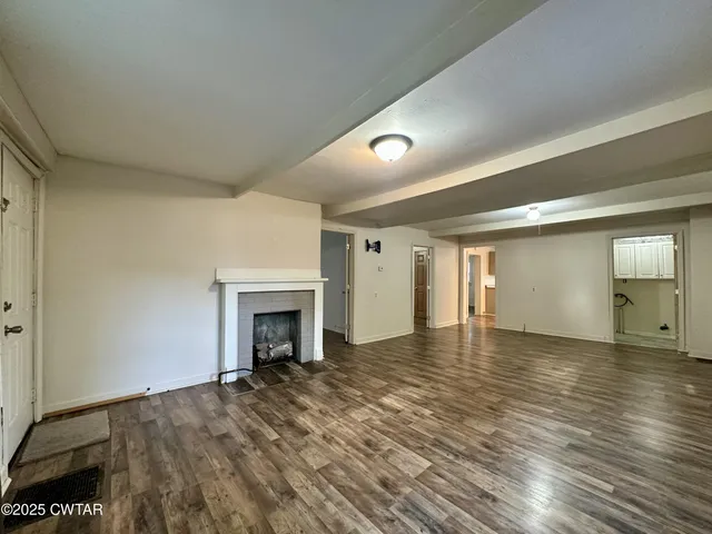 a view of an empty room and window