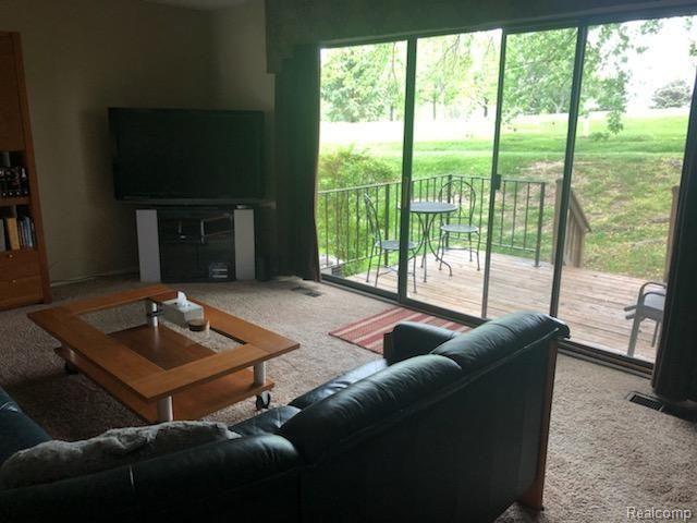 769 Oak Brook Ridge Drive, Unit 120 Rochester, MI 48307 - Photo 6 of 27 LivingroomA.jpeg