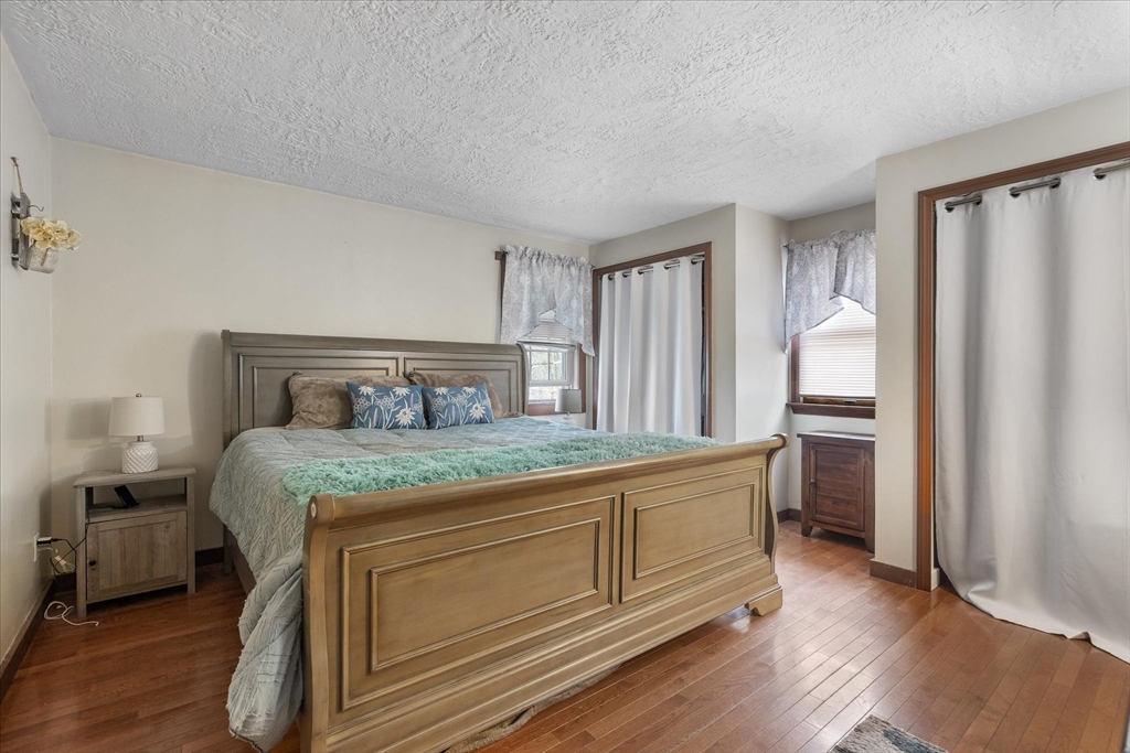 7 Hebert Road Spencer, MA 01562 - Photo 13 of 32 a bedroom with a bed and a window