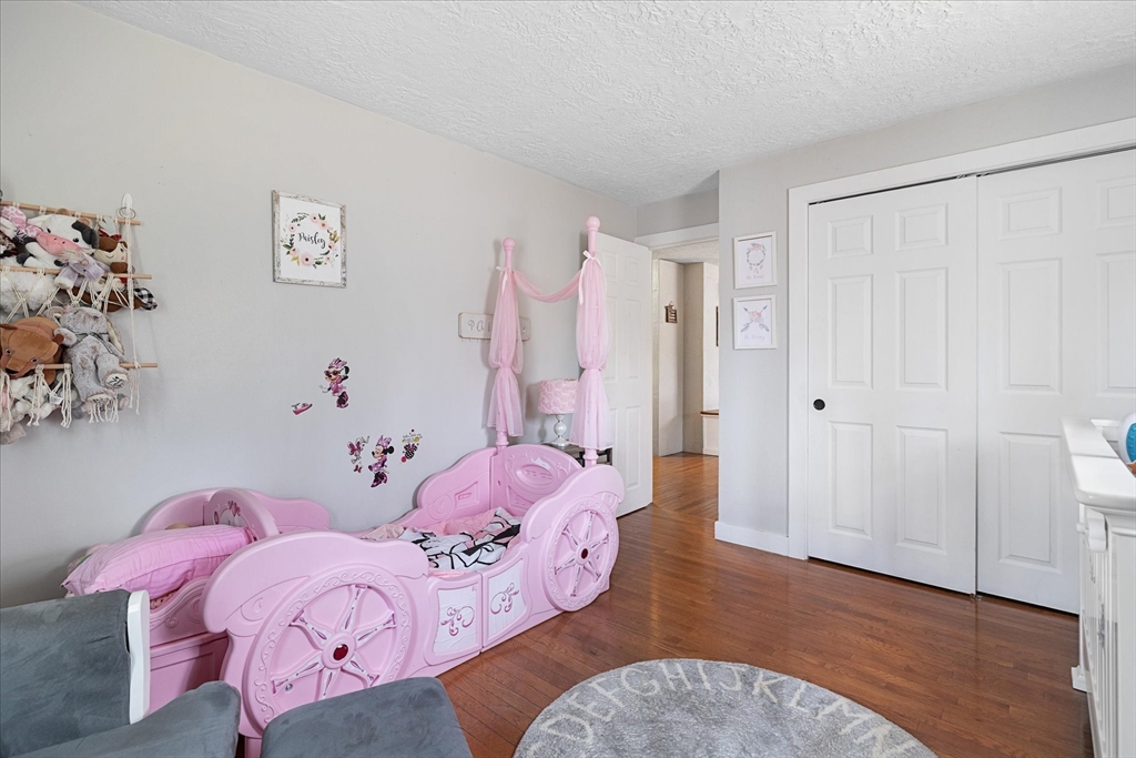 7 Hebert Road Spencer, MA 01562 - Photo 17 of 32 a bedroom with pink walls and pink walls