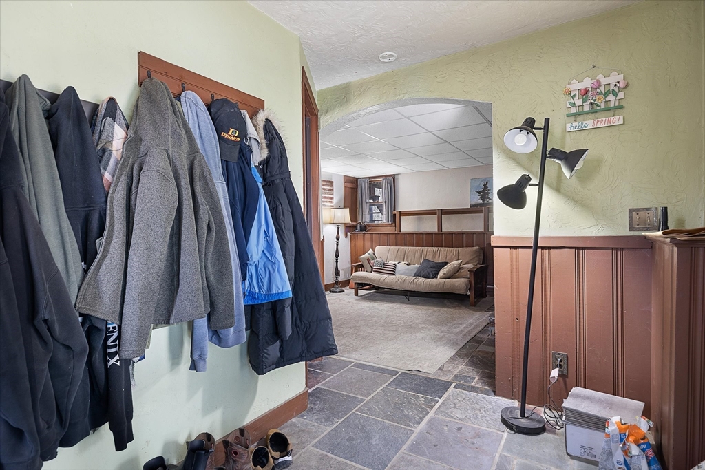 7 Hebert Road Spencer, MA 01562 - Photo 20 of 32 a view of walk in closet with clothes and shoes