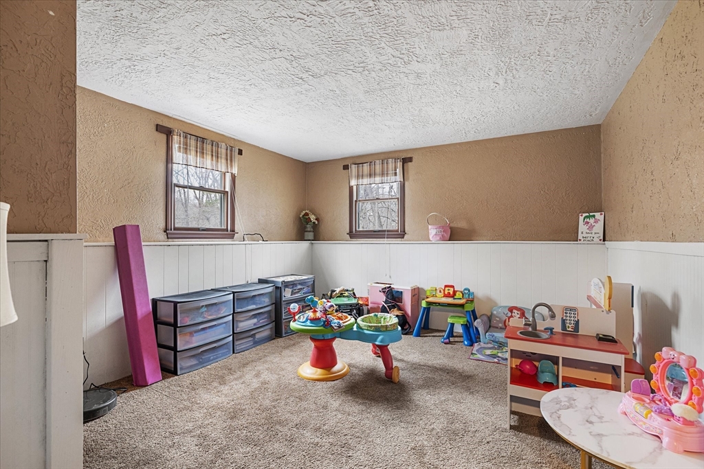 7 Hebert Road Spencer, MA 01562 - Photo 21 of 32 a view of a room with baby toys