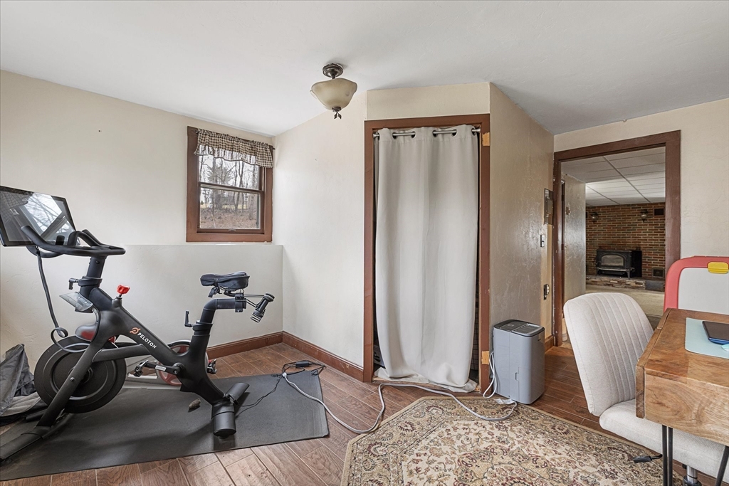 7 Hebert Road Spencer, MA 01562 - Photo 24 of 32 a view of a room with gym equipment