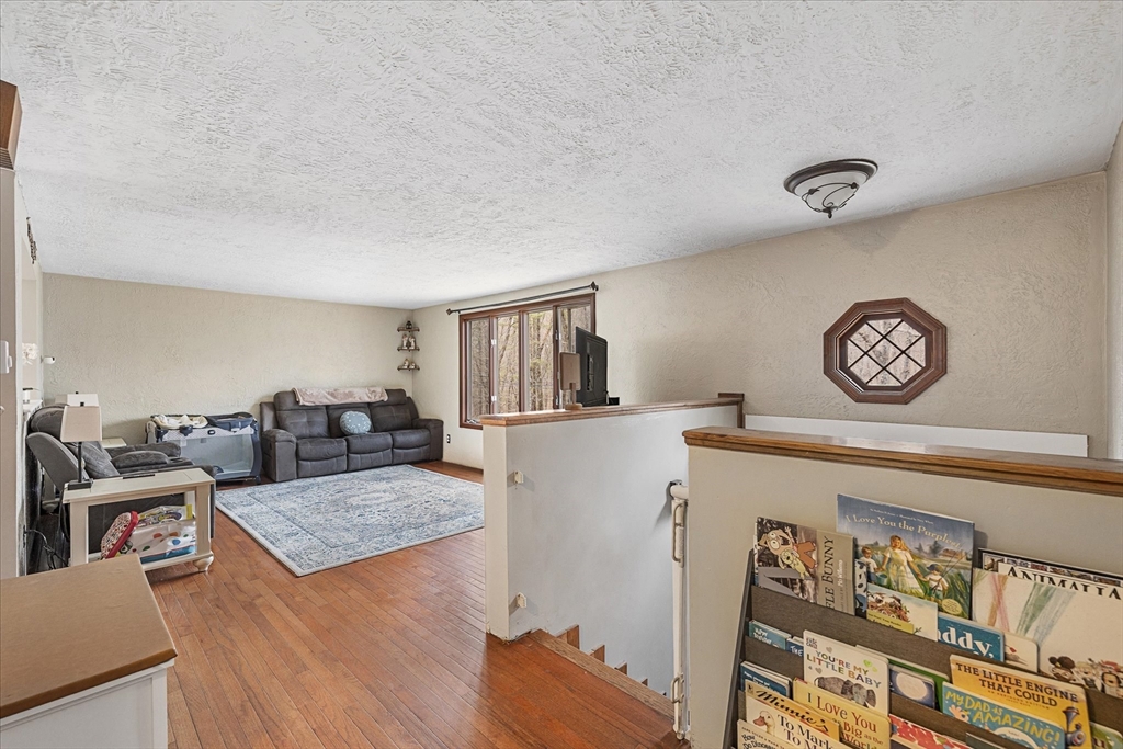 7 Hebert Road Spencer, MA 01562 - Photo 7 of 32 a living room with furniture and a table