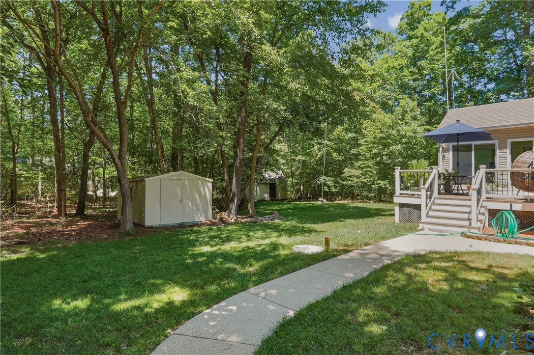 12512 2nd Branch Road Chesterfield, VA 23838 - Photo 44 of 56 a view of a house with backyard sitting area and garden