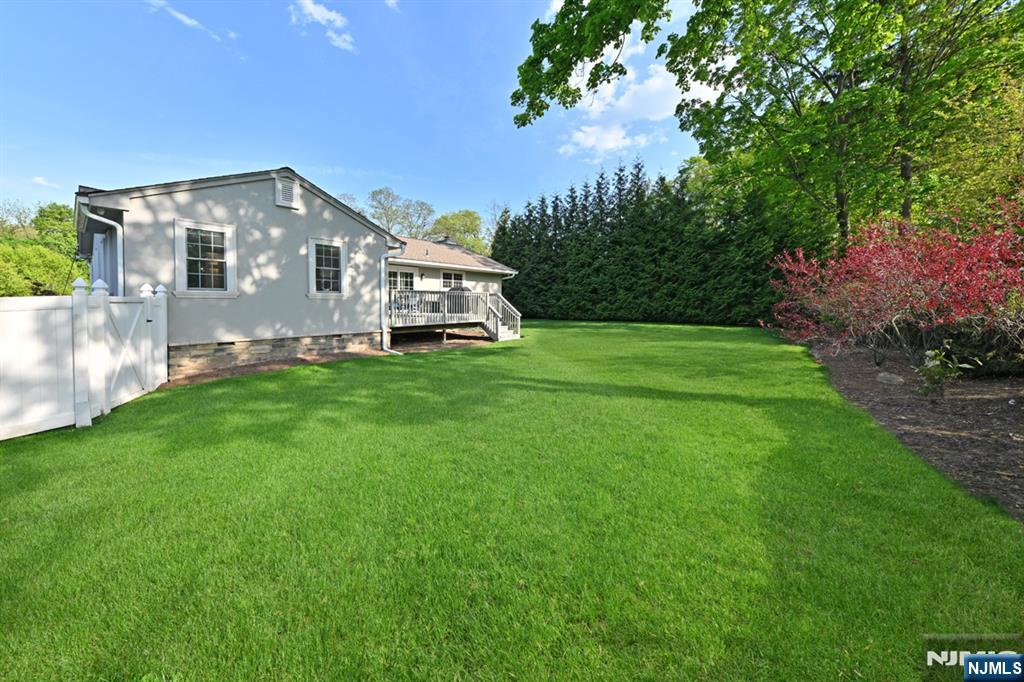 40 Plymouth Road Hillsdale, NJ 07642 - Photo 29 of 33 a view of a house with a yard and sitting area