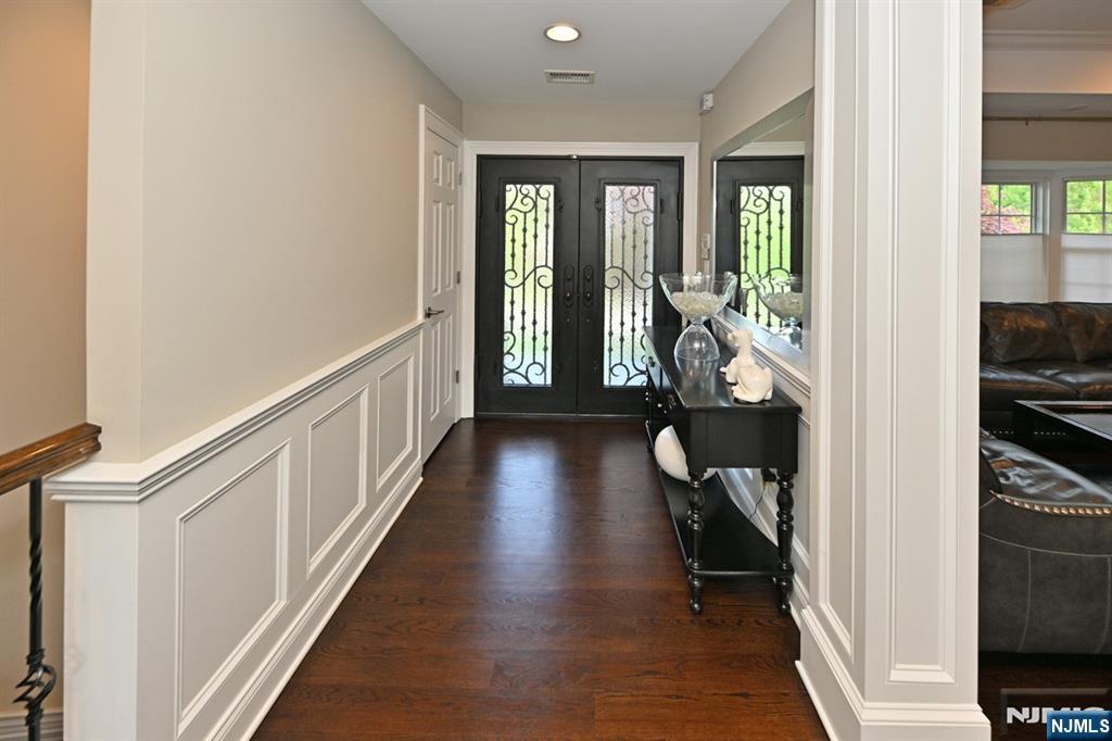 40 Plymouth Road Hillsdale, NJ 07642 - Photo 3 of 33 a view of a hallway with wooden floor and stairs