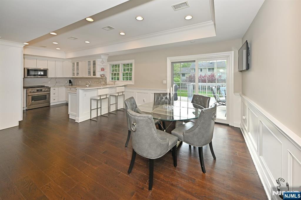 40 Plymouth Road Hillsdale, NJ 07642 - Photo 7 of 33 a view of a dining room with furniture window and wooden floor
