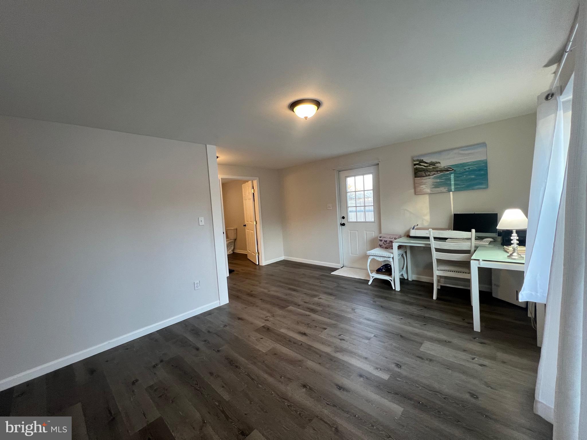 41 Hill Top Road Earleville, MD 21919 - Photo 23 of 51 a living room with furniture and a wooden floor
