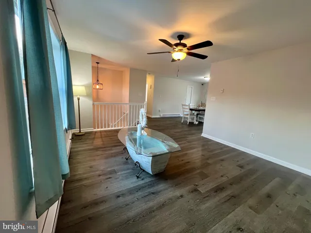 a room with furniture and a window