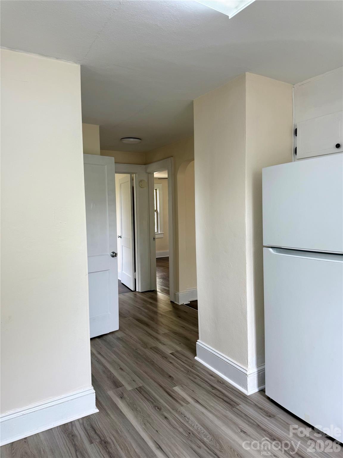 2025 28th Street Northeast Hickory, NC 28601 - Photo 5 of 17 a view of a hallway with wooden floor