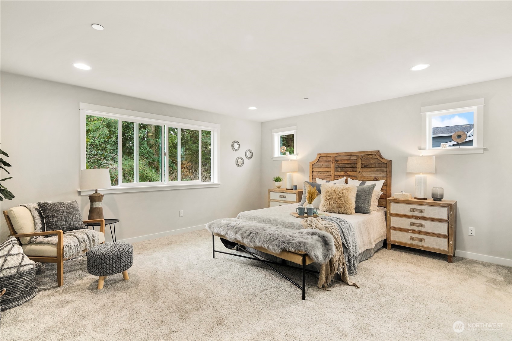 22530 Meridian Avenue South Bothell, WA 98021 - Photo 21 of 35 a bedroom with bed couch and window