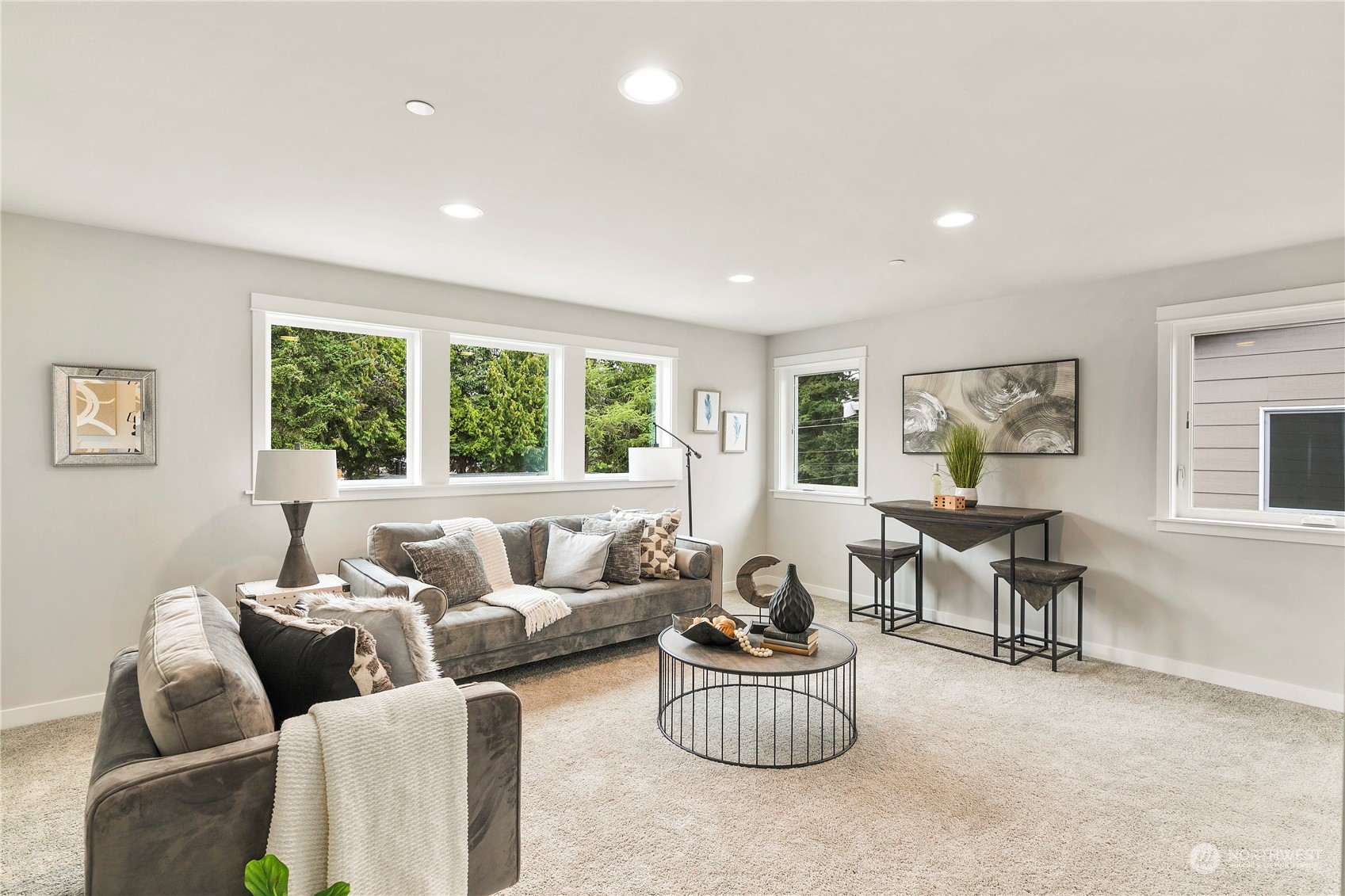 22530 Meridian Avenue South Bothell, WA 98021 - Photo 27 of 35 a living room with furniture and a large window