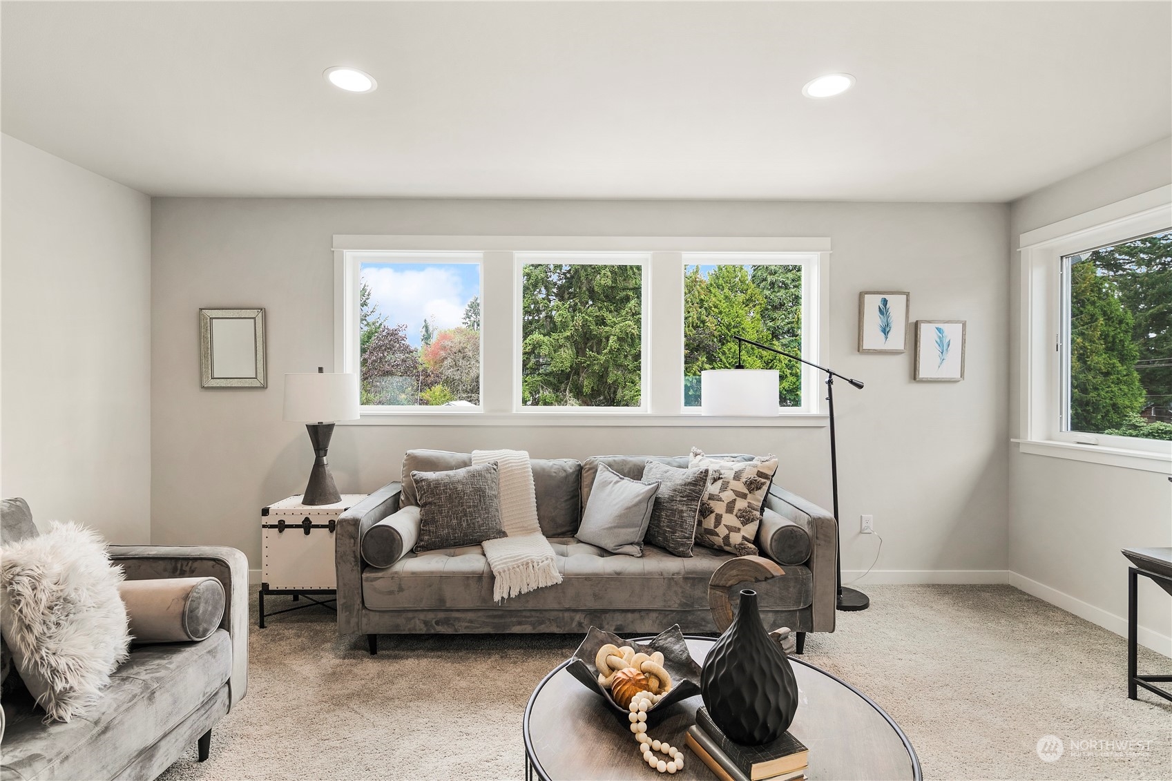 22530 Meridian Avenue South Bothell, WA 98021 - Photo 29 of 35 a living room with furniture and a large window