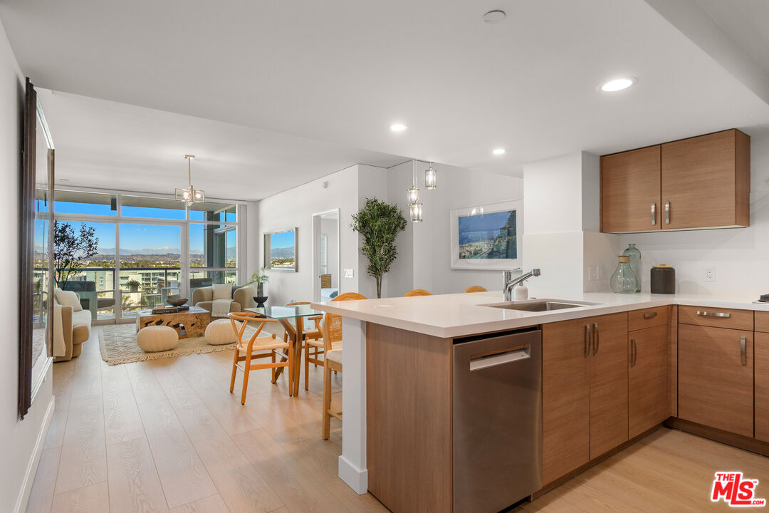 13650 Marina Pointe Drive, Unit 908 Marina del Rey, CA 90292 - Photo 2 of 33 a kitchen with lots of counter top space