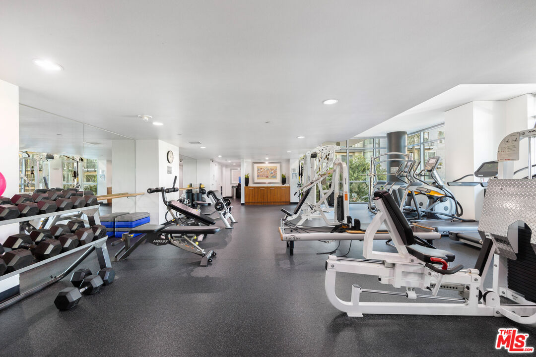 13650 Marina Pointe Drive, Unit 908 Marina del Rey, CA 90292 - Photo 22 of 33 a view of a room with gym equipment