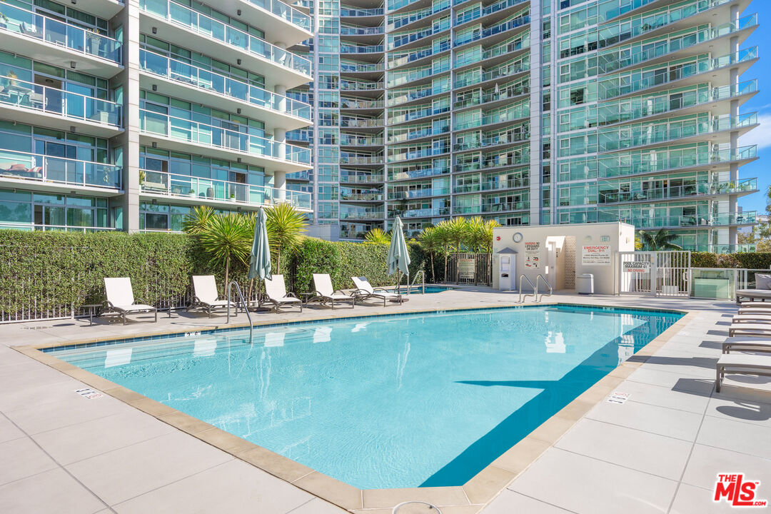 13650 Marina Pointe Drive, Unit 908 Marina del Rey, CA 90292 - Photo 28 of 33 a view of swimming pool with outdoor seating