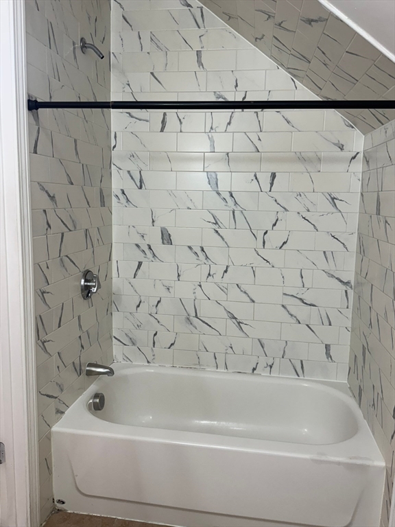 61 Crescent Avenue, Unit 4 Chelsea, MA 02150 - Photo 7 of 9 a bathroom with a bathtub