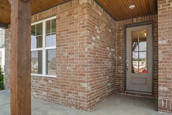 a brick building with a door