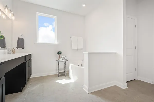 a bathroom with a sink and mirror