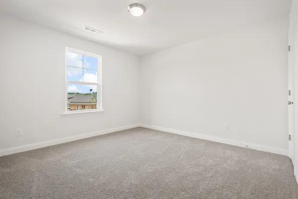 an empty room with an entryway