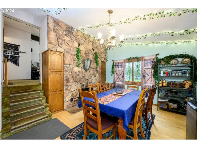 a view of a workspace with furniture