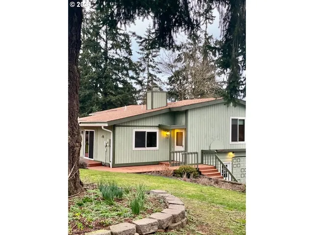 a backyard of a house with seating space