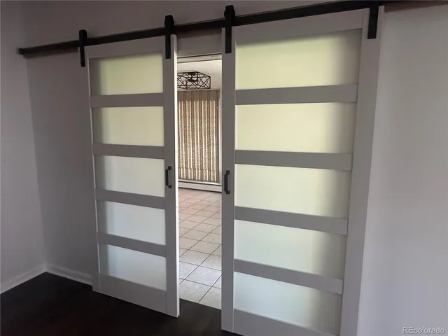 a view of an empty room and window