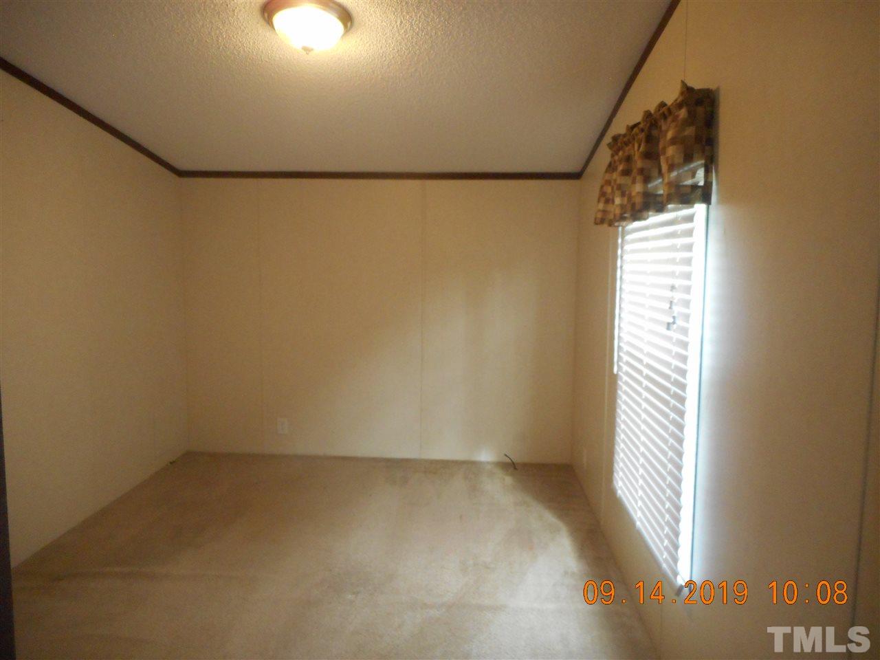 1335 Thomas Store Road Timberlake, NC 27583 - Photo 7 of 13 a view of a small space