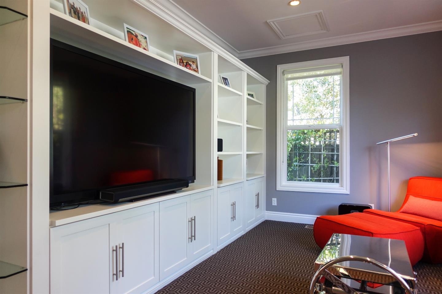 293 Sleeper Avenue Mountain View, CA 94040 - Photo 11 of 17 a bedroom with furniture and flat screen tv