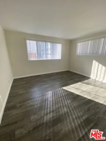 a bathroom with a sink and shower