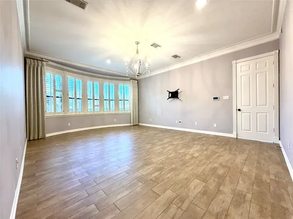 a large bathroom with a large tub sink and double vanity