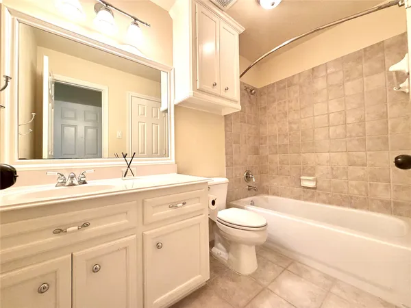 a kitchen with stainless steel appliances a refrigerator sink and cabinets