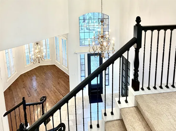a view of a hallway with windows