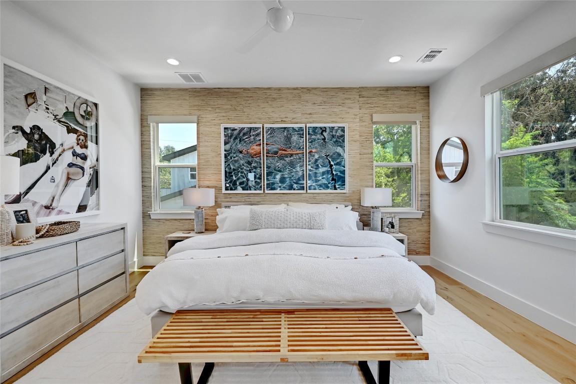 2909 Kuhlman Avenue, Unit 1 Austin, TX 78702 - Photo 18 of 40 a bedroom with a large bed and a window