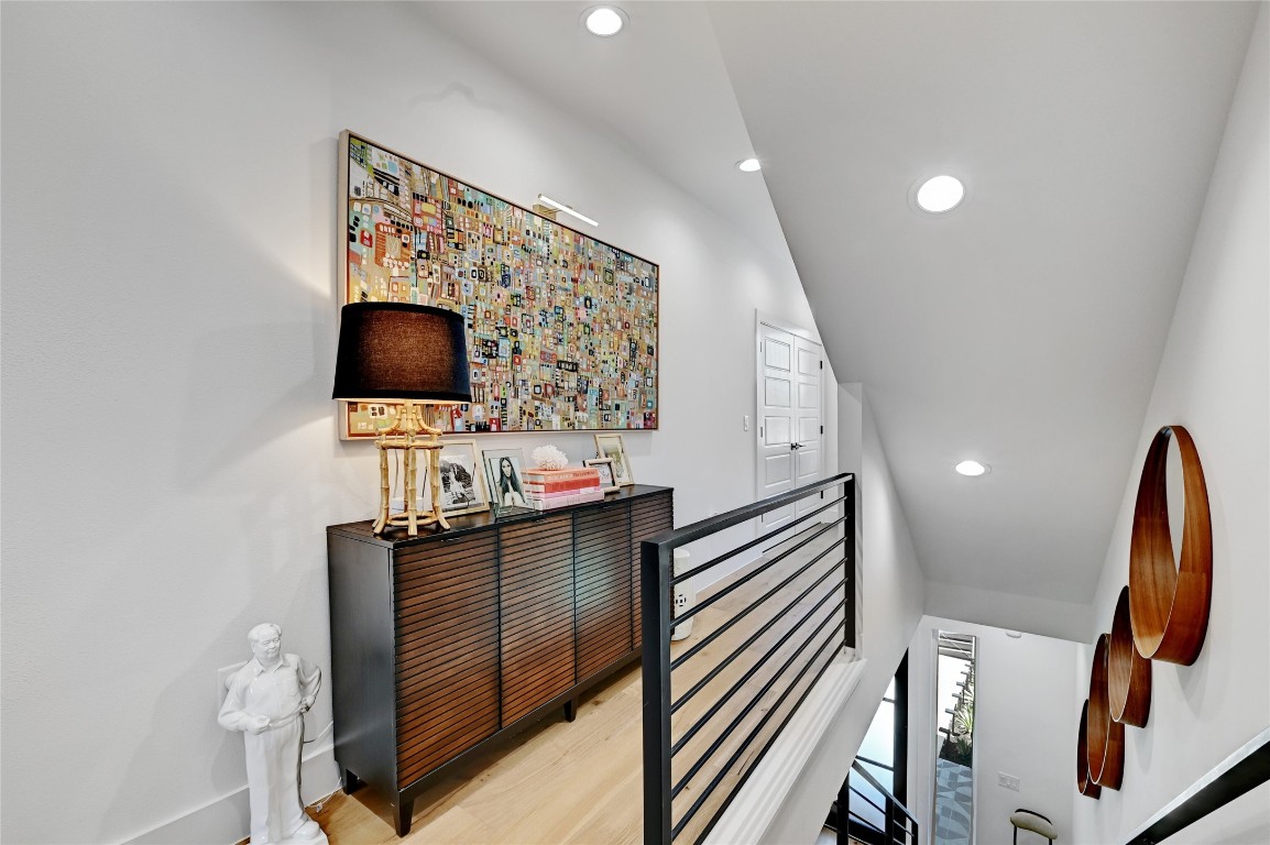 2909 Kuhlman Avenue, Unit 1 Austin, TX 78702 - Photo 25 of 40 a view of a hallway with workspace and mirror