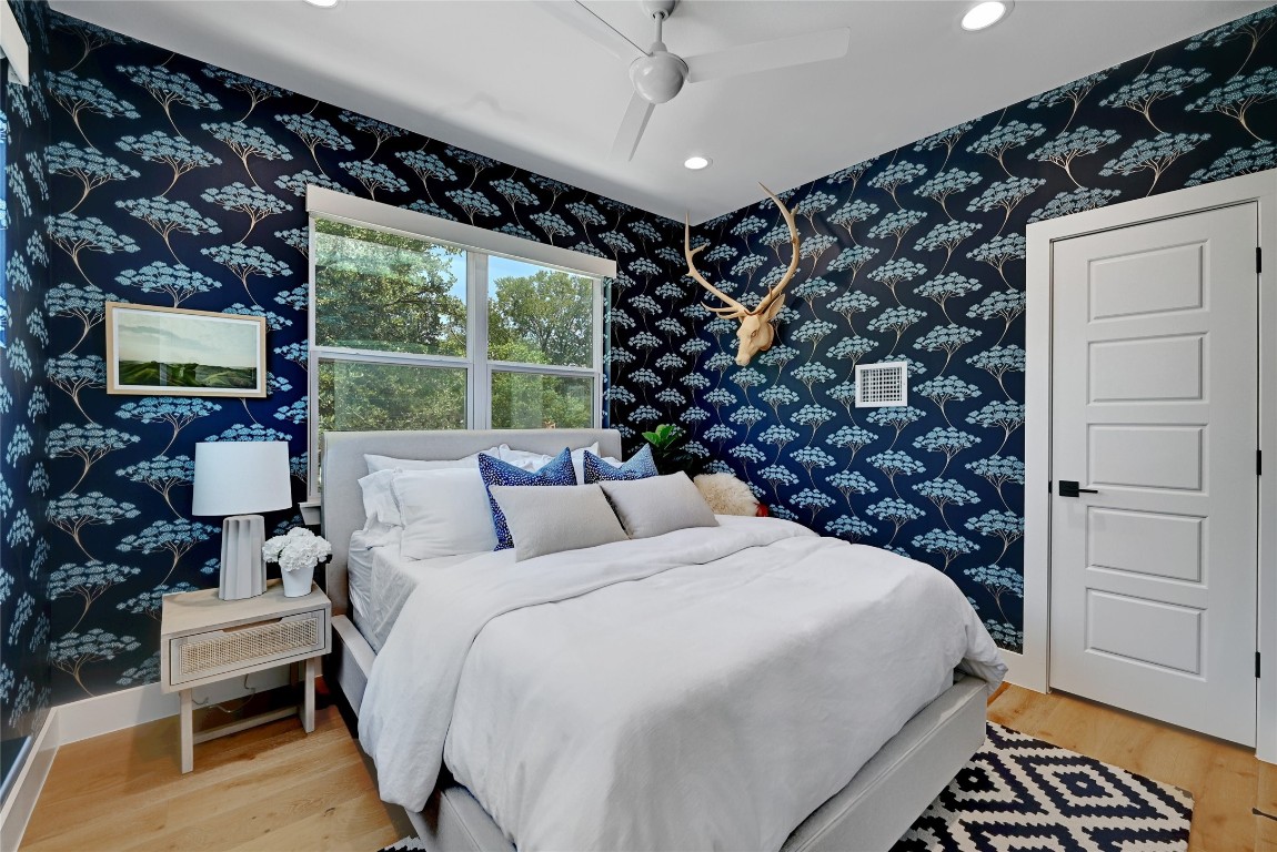 2909 Kuhlman Avenue, Unit 1 Austin, TX 78702 - Photo 26 of 40 a bed room with a bed and a window