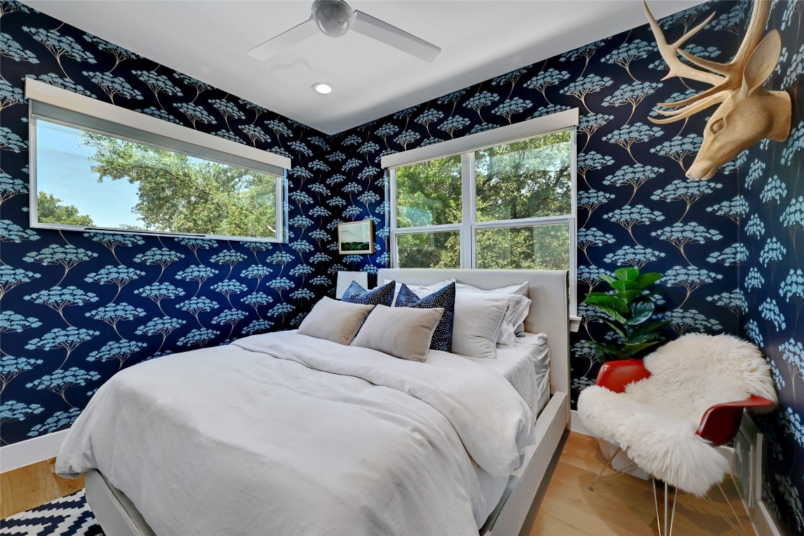 2909 Kuhlman Avenue, Unit 1 Austin, TX 78702 - Photo 27 of 40 a bedroom with bed and a flat screen tv