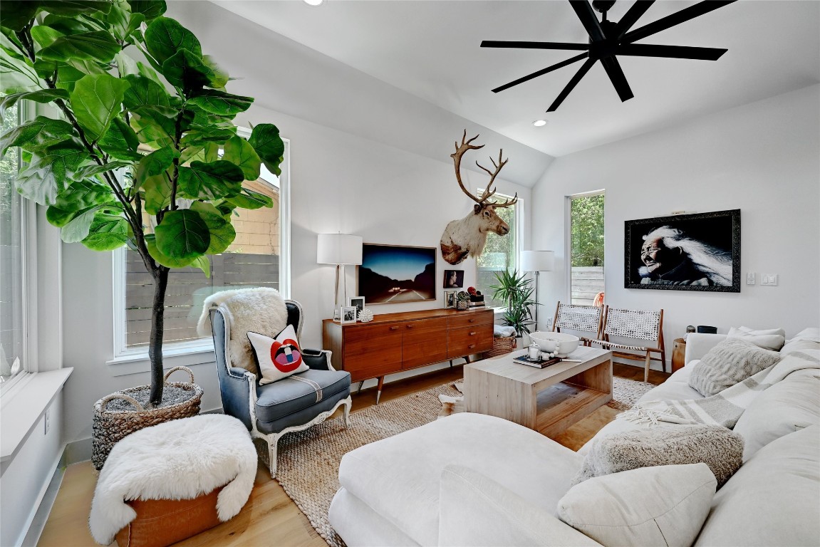 2909 Kuhlman Avenue, Unit 1 Austin, TX 78702 - Photo 6 of 40 a living room with furniture and a flat screen tv