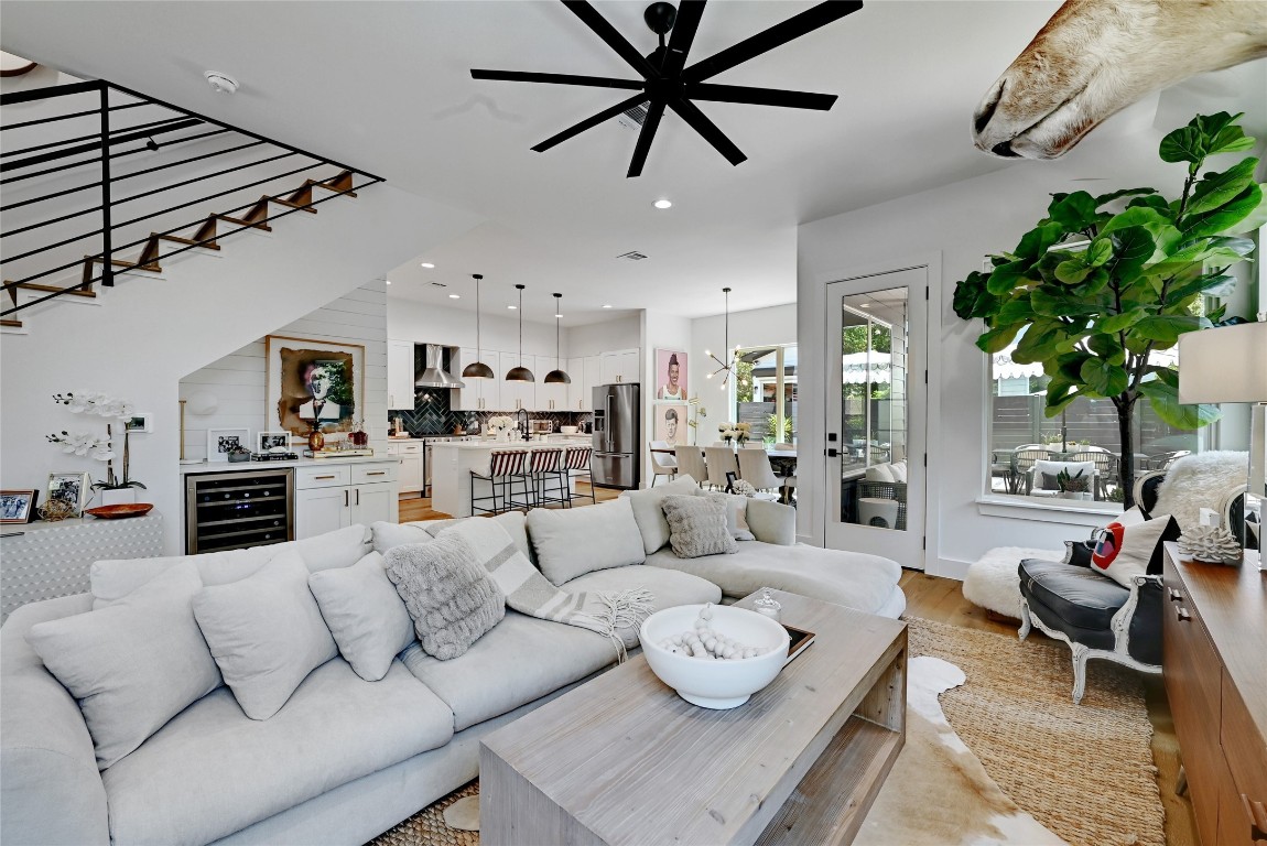 2909 Kuhlman Avenue, Unit 1 Austin, TX 78702 - Photo 7 of 40 a living room with furniture kitchen view and a wooden floor