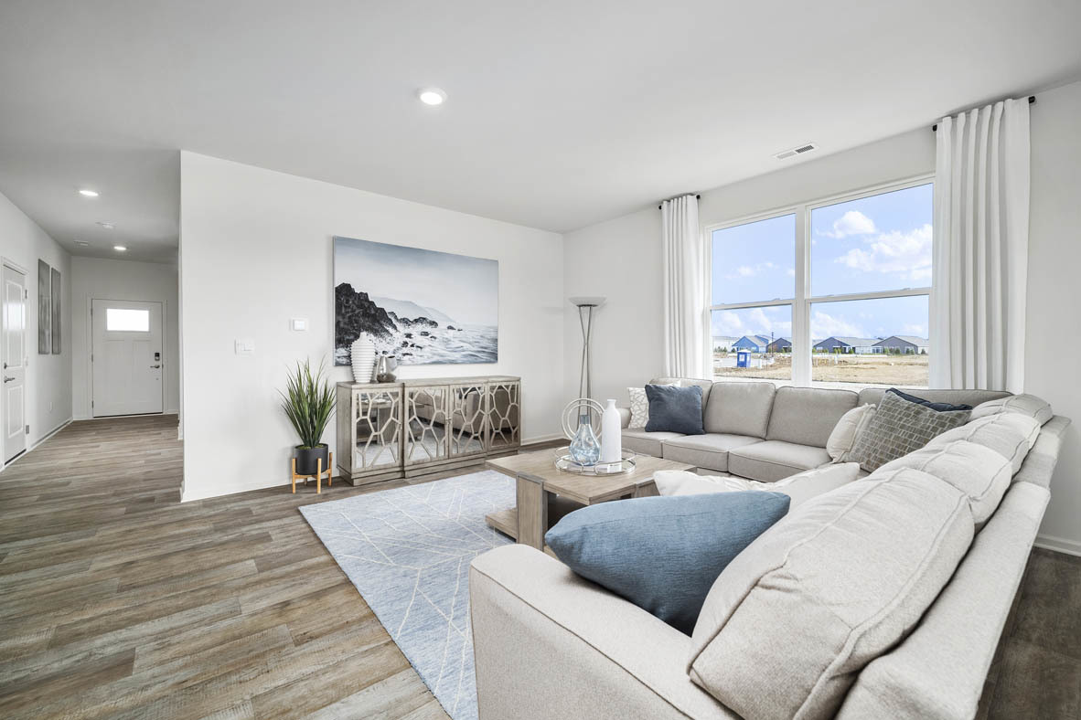 799 Mesa Lane Pingree Grove, IL 60140 - Photo 26 of 54 a living room with furniture and a large window