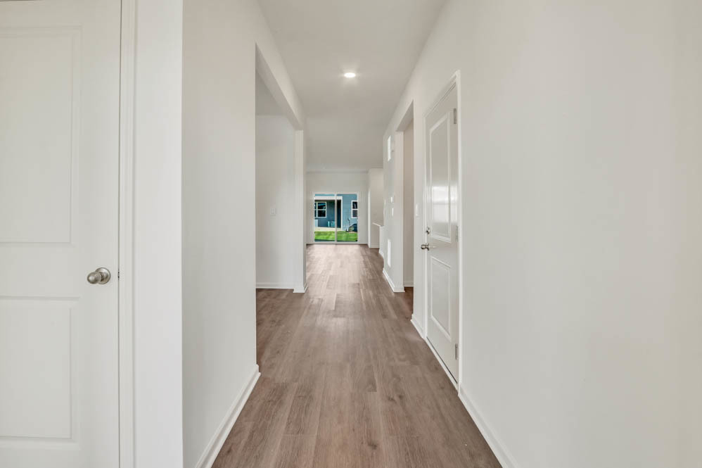 799 Mesa Lane Pingree Grove, IL 60140 - Photo 3 of 54 a view of a hallway with wooden floor